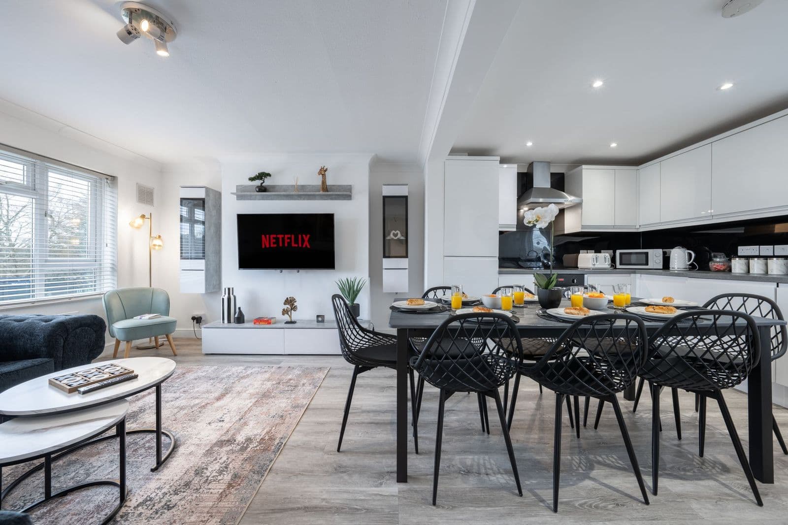 Living and dining area at School Row Elite